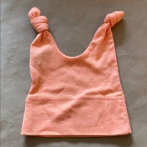 Baby Soy orange baby hat with knots detail